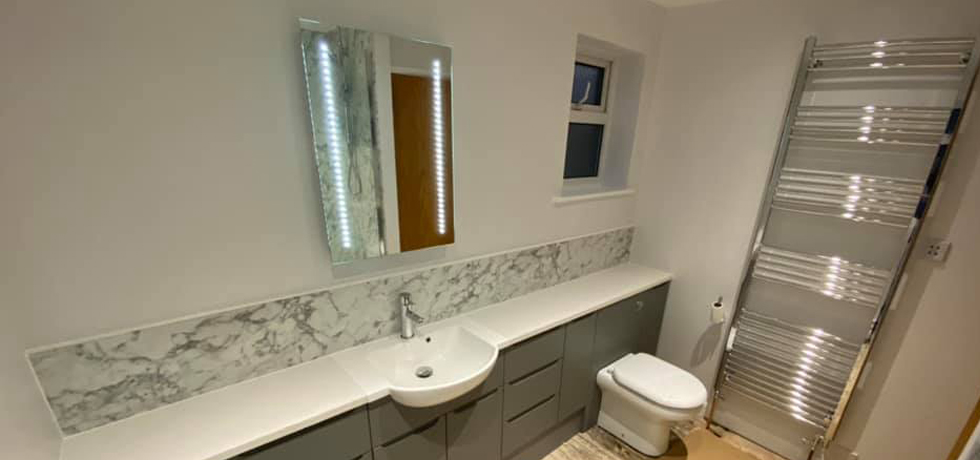 Nuance panels in Marmo Bianco fitted by G D Evans Interiors 